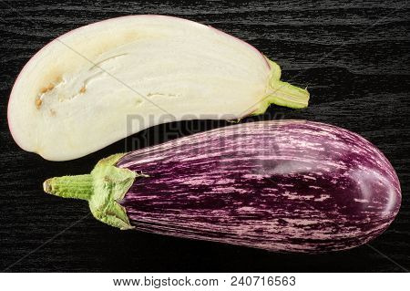 Striped Purple Eggplant Collection Top View Isolated On Black Wood Background One Whole And Sliced S
