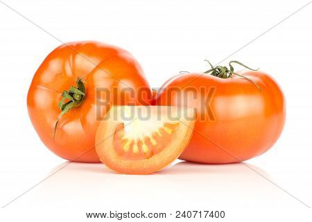 Two Red Tomatoes And One Slice Isolated On White Background Fresh