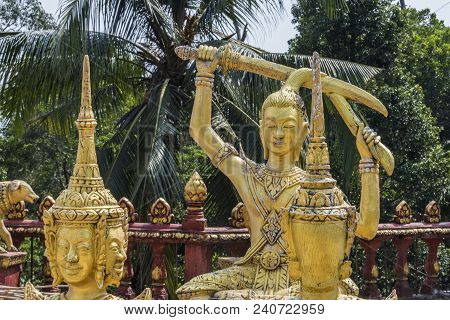 The Temple Of The Buddhist Religious Complex Of Wat Kraom Is Surrounded By Countless Statues In This