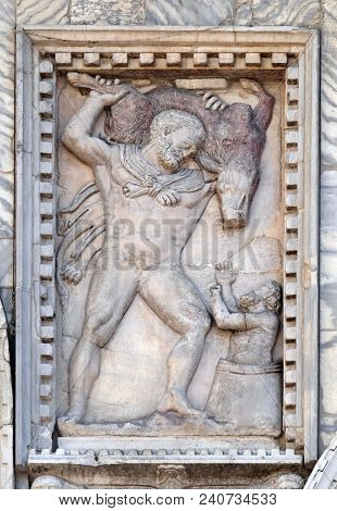VENICE, ITALY - MAY 28 : Relief depicting Hercules and the Erymanthian boar, facade detail of St. Mark's Basilica, St. Mark's Square, Venice, Italy, UNESCO World Heritage Site on May 28, 2017.