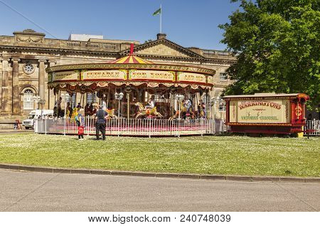31 May 2017: York, North Yorkshire, England, Uk - A Victorian Carousel On The Grass In Front Of The 