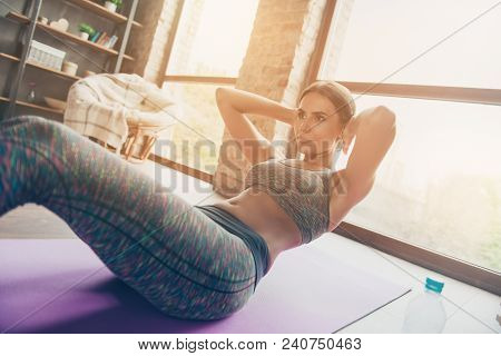 I Want To Burn Excess Weight And Calories! Low-angle Half-turned Profile View Photo Of Concentrated 