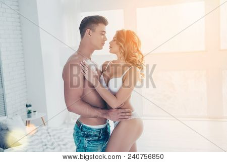 Side View Profile Of Stunning, Young Macho With Naked Torso In Jeans Embracing With Sexy Woman With 