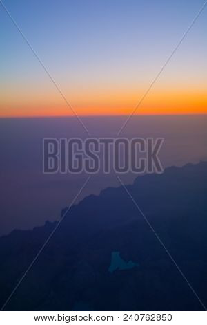 Flight Image At Sunrise Over Tramuntana Mountains And The Cuber Reservoir Filled With Rain Water