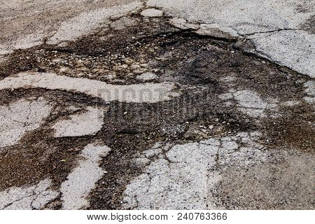 Broken Asphalt, Large Pits On The Road