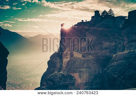 Scenic Sunset Evening Sky Over Holy Varlaam Monastery On Cliff In Meteora, Thessaly Greece. Greek De