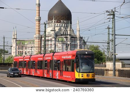 Dresden, Germany - May 10, 2018: Passengers Ride On Public Transportation Electric Tram In Dresden. 
