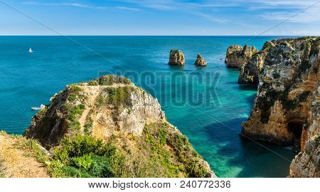 Lagos, Portugal - Circa May 2018: Cliffs View By Atlantic Ocean, Lagos, Algarve, Portugal.