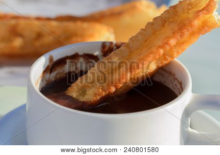 Typical Spanish Snack Churros Are Deep-fried Pastries  And Served With Hot Chocolate Everywhere In S