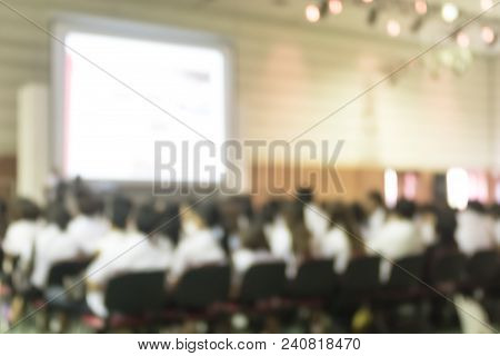 Blurred Abstract Background Of Business Or Educational Conference Seminar In Auditorium Hall