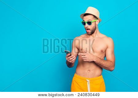 Amazed, Astonished, Attractive, Shocked, Afraid, Scared Guy Looking At Smart Phone In His Hand, Poin