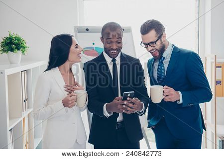 Stylish, Modern, Cheerful Partners In Tux, Tuxedo Having Break Time, Watching Comic Video During Cof