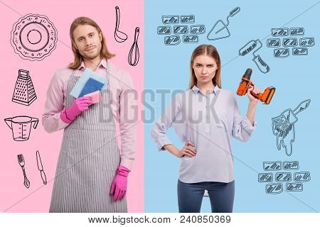 Wrong Responsibilities. Serious Young Woman Being Puzzled While Holding Electric Screwdriver And Sta