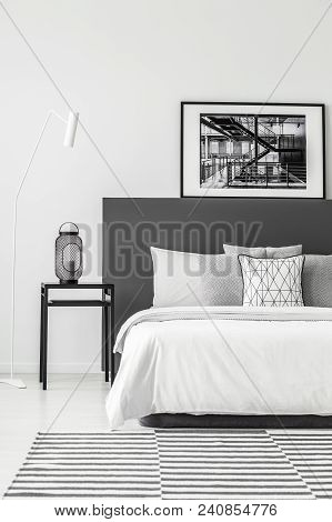 Poster In Minimal Bedroom Interior