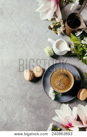 Blue Cup Of Black Espresso Coffee French Dessert Macaroons, Cream And Spring Flowers Magnolia, Bloom