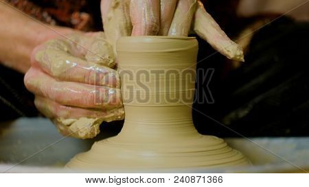 Professional Male Potter Making Mug In Pottery Workshop, Studio. Handmade, Art And Handicraft Concep