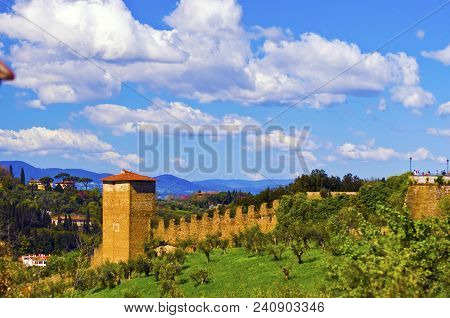 Country Dreams: An Ancient Defensive Stone Wall Running Through The Countryside Surrounding Florence