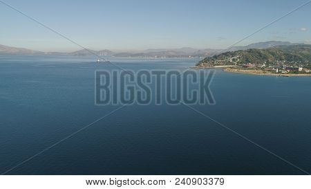 Aerial View: Cargo, Reefer Ship In The Sea Bay. Subic Bay, Philippines, Luzon. Cargo Ship In The Har