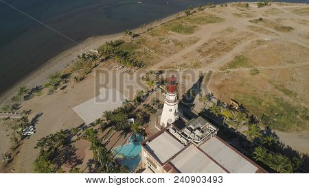 Coastline With Beach And Lighthouse. Aerial View: Coast Sea With Hotels, Resorts, Subic Bay, Philipp