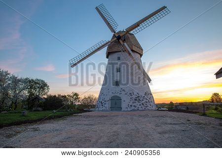 Traditional Old Dutch Windmill In Latvia. Sunrise View To Araisi Windmill In Vidzeme.