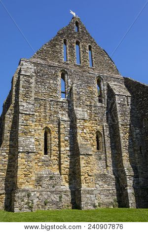 Part Of The Ruins Of The Historic Battle Abbey In The Town Of Battle In East Sussex.  The Abbey Is L