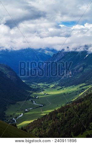 River Valley Among High Mountains Under Cloudy Sky Arkhiz