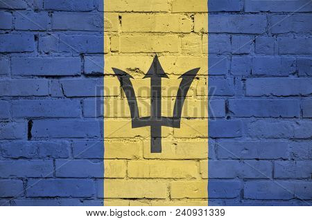 Barbados Flag Is Painted Onto An Old Brick Wall