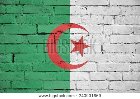Algeria Flag Is Painted Onto An Old Brick Wall