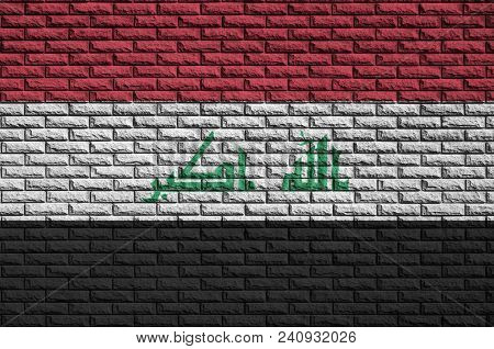 Iraq Flag Is Painted Onto An Old Brick Wall
