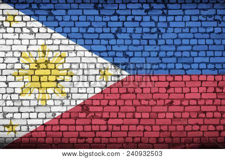Philippines Flag Is Painted Onto An Old Brick Wall