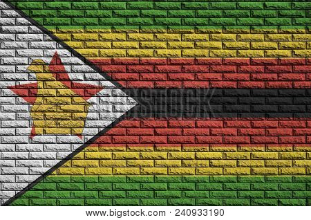 Zimbabwe Flag Is Painted Onto An Old Brick Wall
