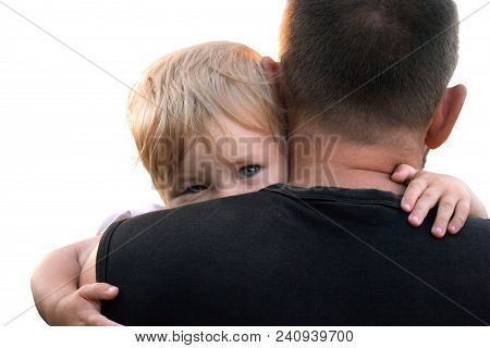 The Kid Hides Behind The Daddy.