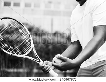 Player getting ready for a serve in tennis