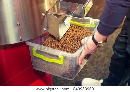 Coffee Beans After Roasting Process In Professional Machine. Drum Type Roaster. Rosting Process Of C