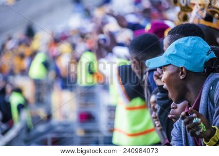 Cape Town, South Africa, 12 May 2018 - Diverse South African Football Supporters Cheering And Celebr