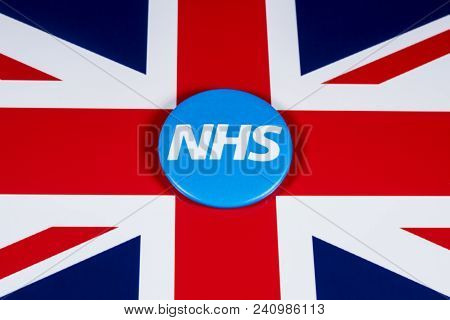 London, Uk - April 27th 2018: The National Health Service Symbol Over The Uk Flag, On 27th April 201