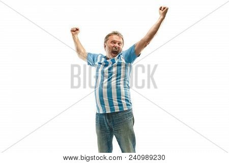 The Senior Argentinean Fan Celebrating On White Background. The Mature Man In Soccer Football Unifor