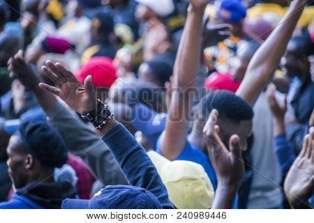 Cape Town, South Africa, 12 May 2018 - Diverse South African Football Supporters Cheering And Celebr