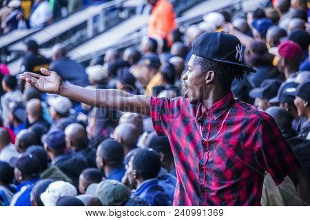 Cape Town, South Africa, 12 May 2018 - Diverse South African Football Supporter Arguing With A Decis