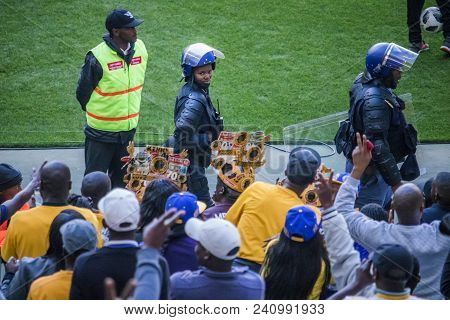 Cape Town, South Africa, 12 May 2018 - Diverse South African Football Supporters Cheering And Celebr