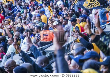 Cape Town, South Africa, 12 May 2018 - Diverse South African Football Supporters Cheering And Celebr