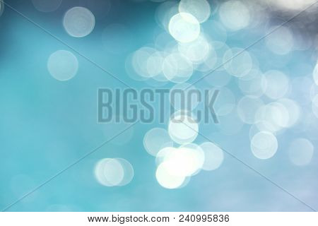 Colorful Twinkling Beach Reflect Bokeh Light Background.