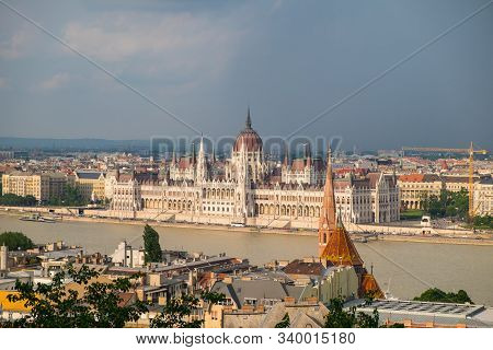 View Of Historical Building Of Hungarian Parliament On Danube River In Budapest, Hungary, Europe.