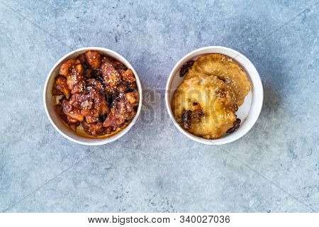 Take Away Asian Food Chinese General Tsos Chicken And Fried Pineapple Fritters Caramelized With Cinn