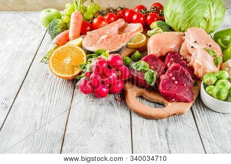 Trendy Pegan Diet - Vegan Plus Paleo Diet Food Concept, Many Fresh Vegetables, Fruits, Raw Beef And 