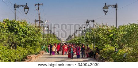 Lumbini, Nepal - November 09, 2019: Panorama Of People Walking The Path To The Mayadevi Temple In Lu