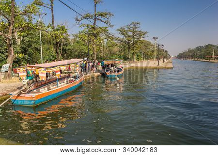 Lumbini, Nepal - November 09, 2019: Colorful Motorboats At The Canal Of The Mayadevi Temple In Lumbi
