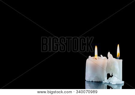 Burning Candles On A Black Background. Symbol Of Religion Or Grief And Loss Or Tragedy. Template For