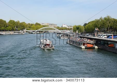 Paris, France - September 16, 2019: Tourist River Cruise Ferry Full With Passengers At The Port De L
