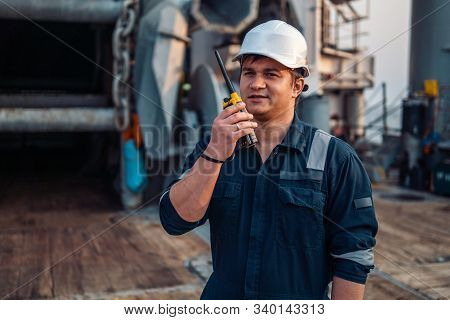Marine Deck Officer Or Chief Mate On Deck Of Offshore Vessel Or Ship , Wearing Ppe Personal Protecti